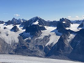 Photo 2: Magnificent glacier landscapes in East Greenland with steep glaciers and high mountain peaks (Photo credit: Christiane Leister)