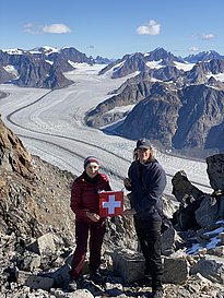 Photo 8: Christiane Leister (initiator and leader of the expedition) and Julian Charrière (Swiss artist who accompanied us for an art project) visit “Schweizerland”, named after the Swiss geophysicist and Arctic explorer Alfred de Quervain (Photocredit: Christiane Leister)